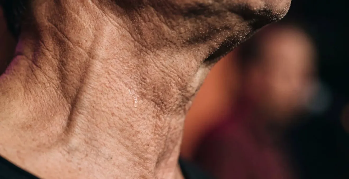 Extreme close-up capturing the textural essence of the cracked flamenco vocal timbre