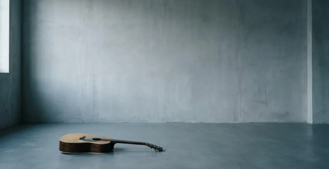 Wide environmental shot showing single instrument suspended in vast negative space emphasizing silence
